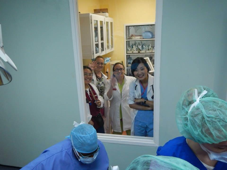 Dr. Sara Ochoa and friends observing a surgery.
